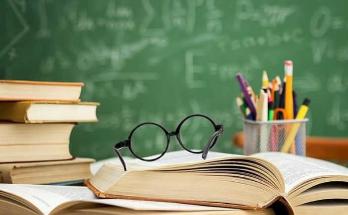 books, pencils, and glasses